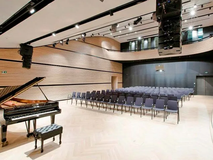 Concert hall with radiant surface elements installed behind the wall and ceiling panelling
